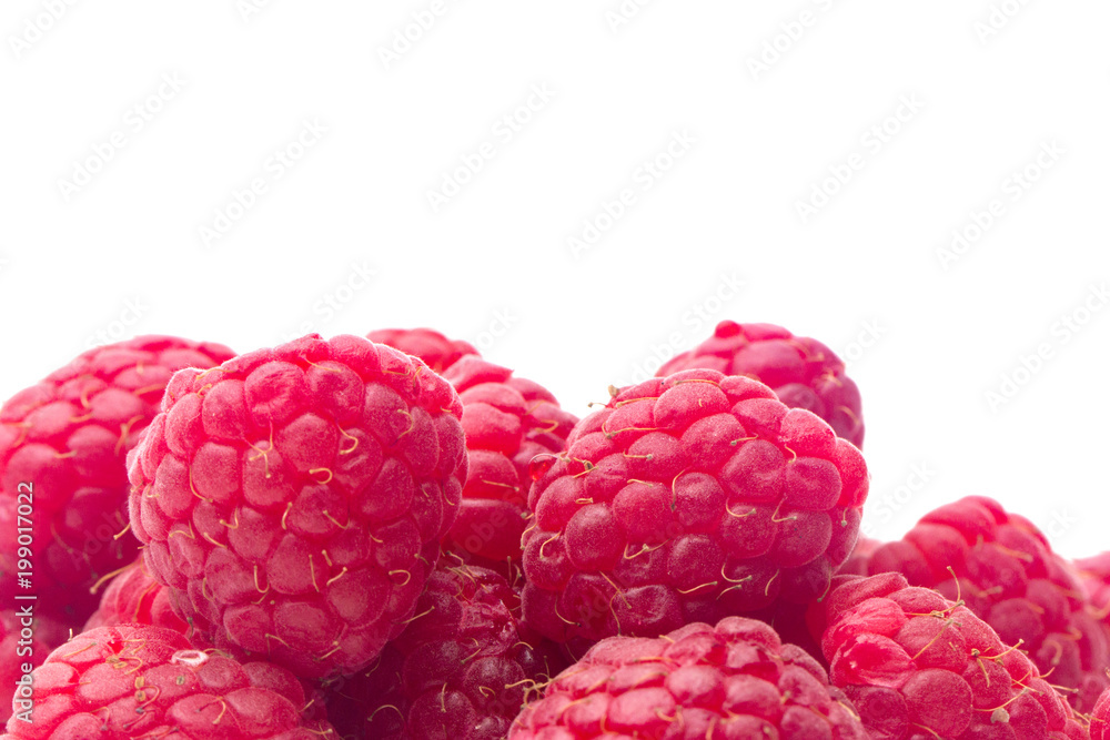 Fresh Red Raspberries Isolated on a White Background Fresh Red Raspberries Isolated on a White Background