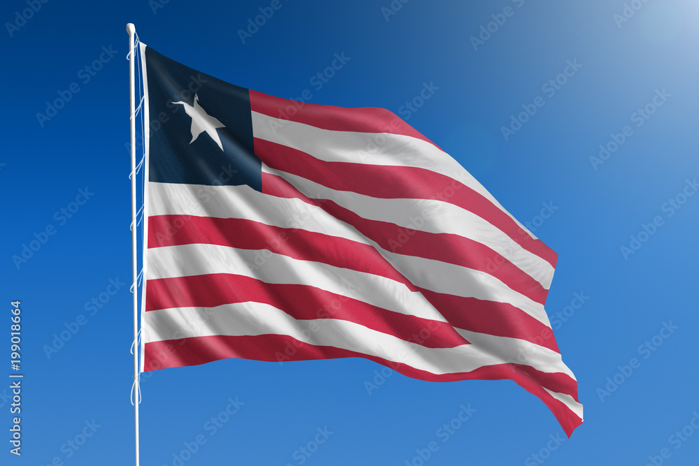 Liberia flag in front of a clear blue sky