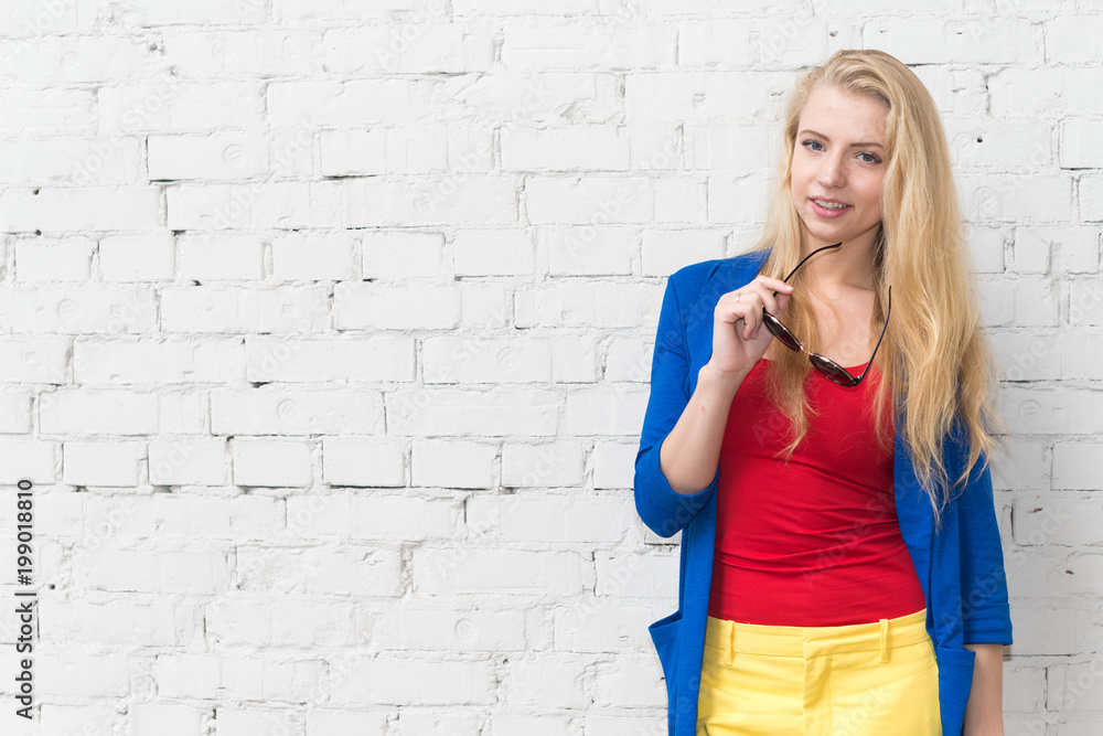 Woman in front of a white wall Woman in front of a white wall