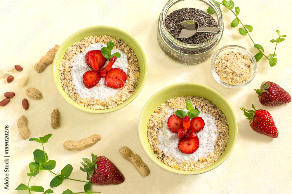Chia pudding with coconut milk, strawberries and peanuts Chia pudding with coconut milk, strawberries and peanuts