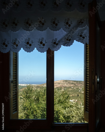 View of rural field from window  Crete  Greece