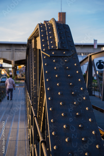 old metal bridge for railway transport and pedestrians in Basel, Switzerland. Europe. photo