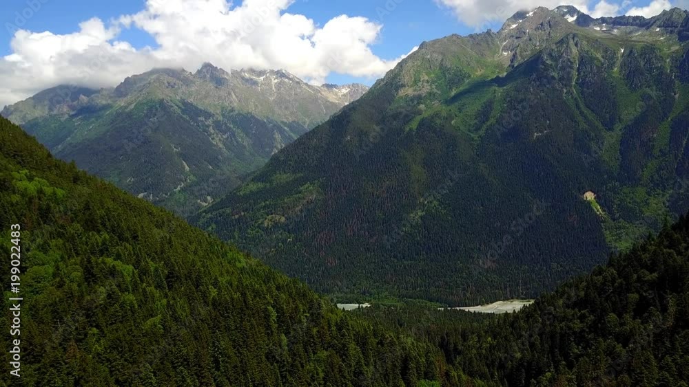 AERIAL: Flying over mountain river. gorge Amanauz, Sufrudzhinsky waterfalls. Great waterfalls. Dombai, Karachay-Cherkessia, the North Caucasus in summer.4k AERIAL: Flying over mountain river. gorge Amanauz, Sufrudzhinsky waterfalls. Great waterfalls. Dombai, Karachay-Cherkessia, the North Caucasus in summer.4k