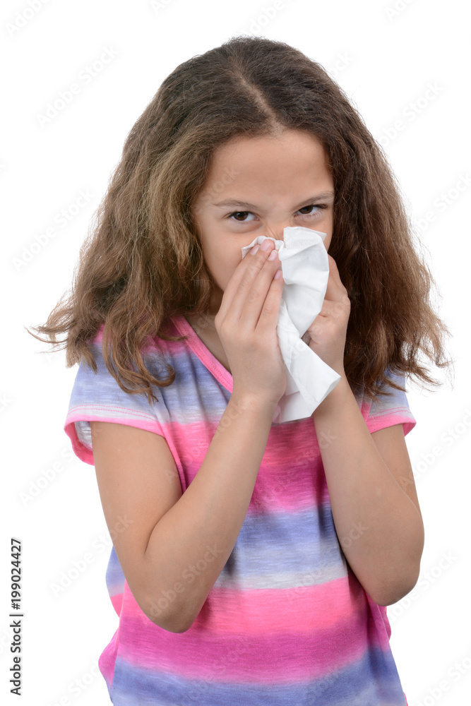 Young girl blowing her nose with tissue health concept white background Young girl blowing her nose with tissue health concept white background