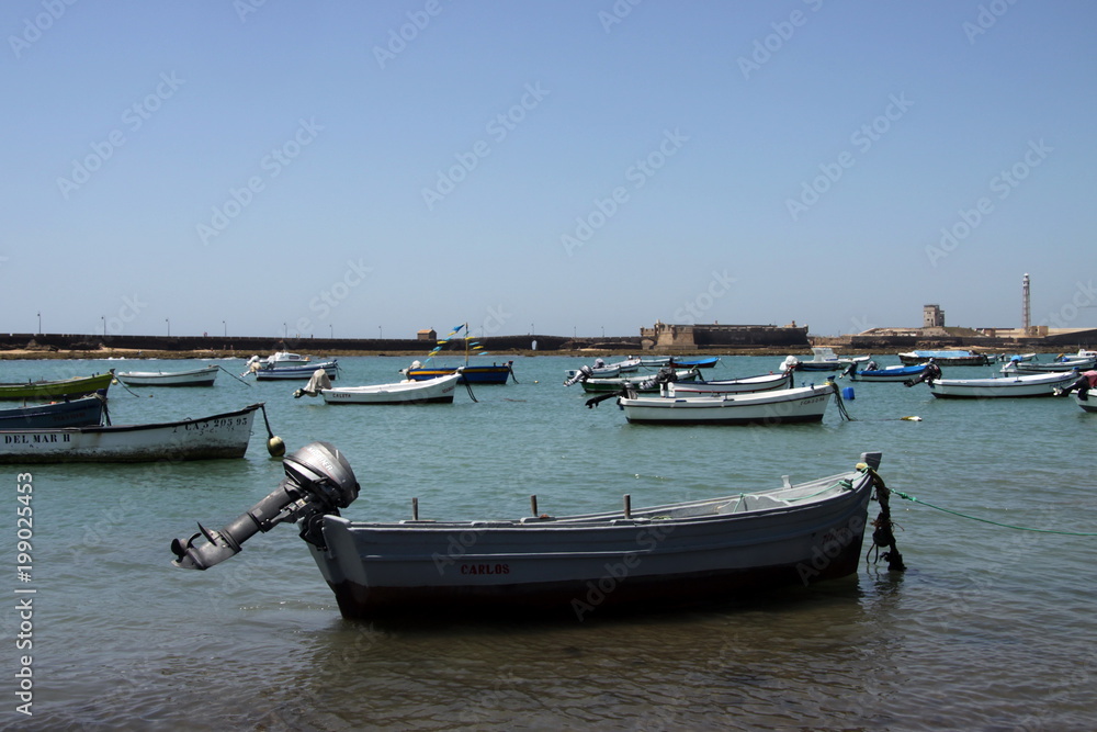  Boats off the Atlantic coast near the fortress of San Sebastian in Cadiz.