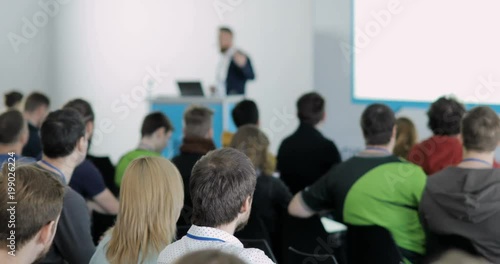 Wallpaper Mural people at a conference. They talk about modern technologies and IT. Problems of digital security, IT people. Listen to the speaker Torontodigital.ca