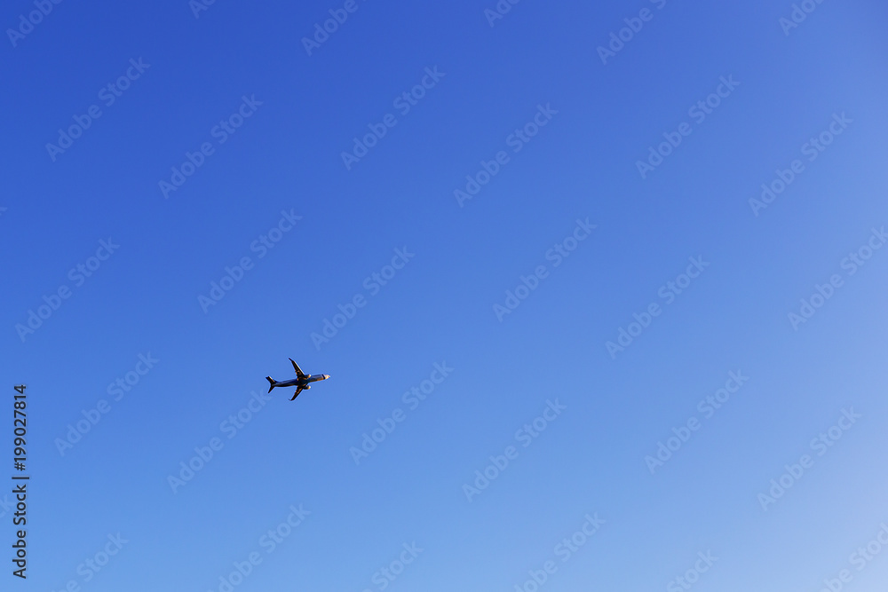 blue sky flying plane, minimalism blue sky flying plane, minimalism