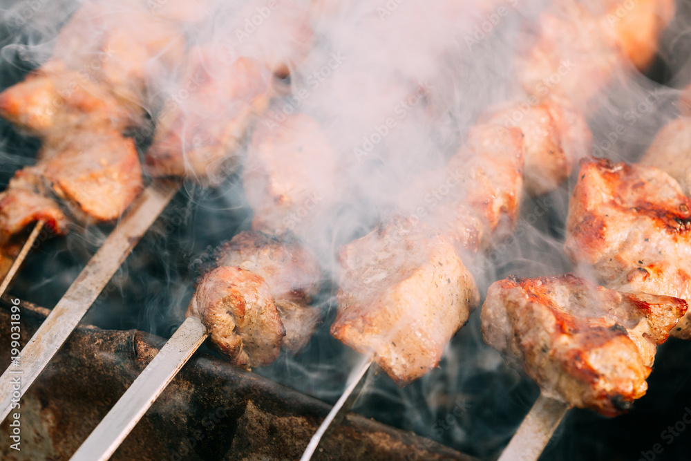 Grilled Barbecue Meat Shashlik Shish Kebab Pork Meat Grilling On Metal Skewer Grilled Barbecue Meat Shashlik Shish Kebab Pork Meat Grilling On Metal Skewer