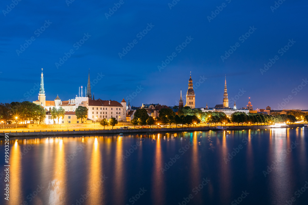 Evening In Riga, Latvia. Night View With Blue Sky. Copyspace.