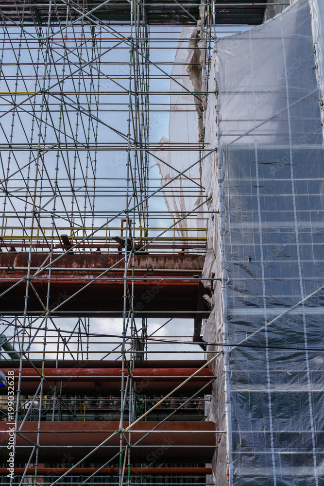 building construction site with scaffolding