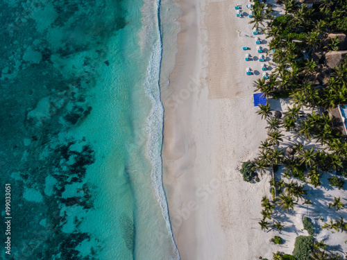 Aerial view of Sea side beach. Top view aerial photo of beauty nature landscape with tropical beach in Tulum, Mexico. Caribbean Sea, coral reef, top view