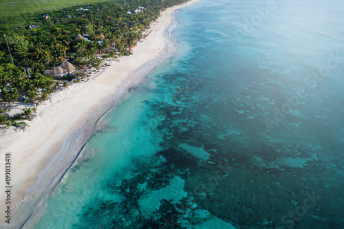 Sea Aerial view, Top view, amazing nature background. The color of the water and beautifully bright. Azure beach. Top view aerial photo from flying drone of an amazingly beautiful sea landscape. © Irina