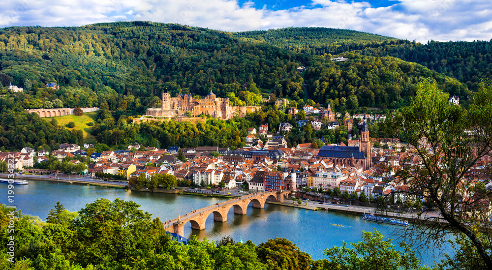 Fototapeta premium Heidelberg Cityscape with Medieval Castle and Old Bridge over Neckar River, Panoramic View of Altstadt District, Romantic German Landmark in Baden-Wurttemberg, Famous European Travel Destination