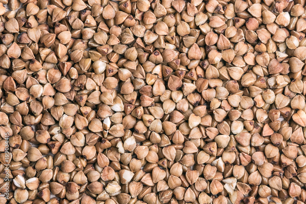 Buckwheat grains close-up. Macro photography. Buckwheat grains close-up. Macro photography.