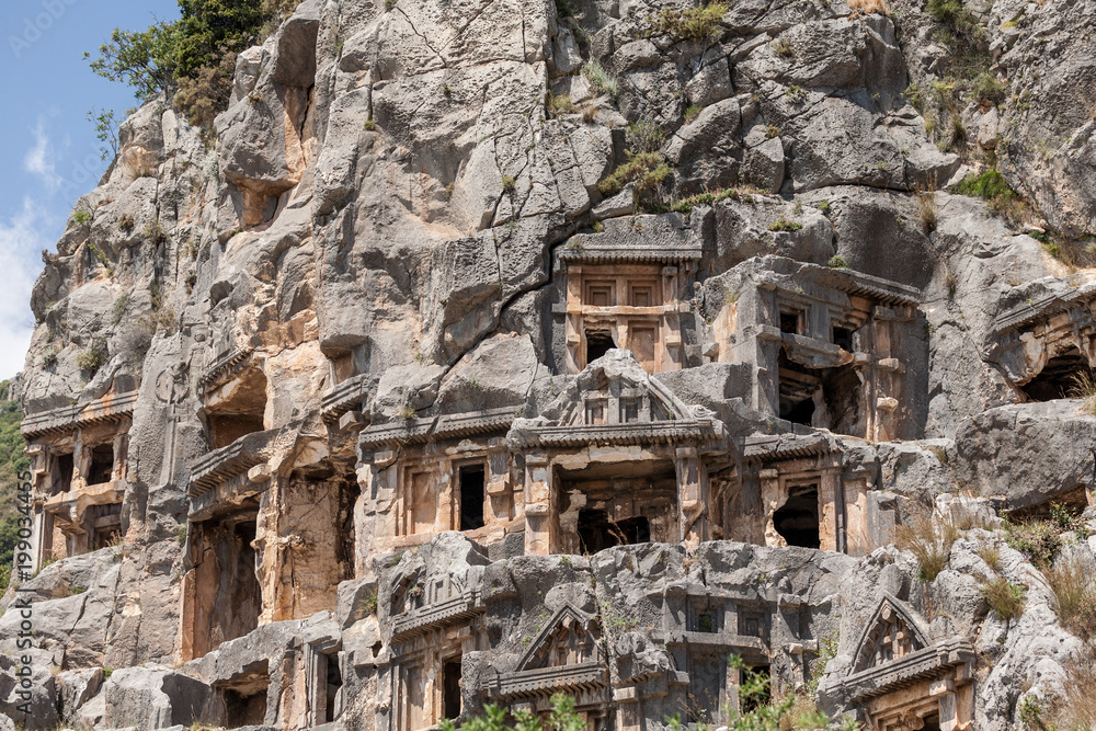 Ancient lycian necropolis  with tomb carved in rocks in Mira,