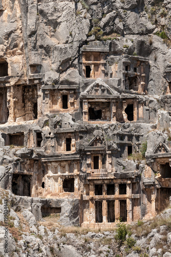Ancient lycian necropolis with tomb carved in rocks in Mira,