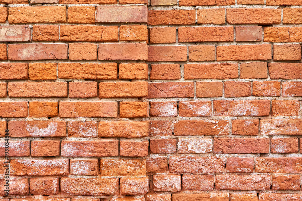 Old split-level red brick wall Old split-level red brick wall