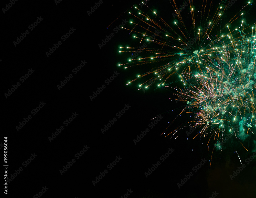 Obraz premium Colorful bright green fireworks and smoke in the night sky background