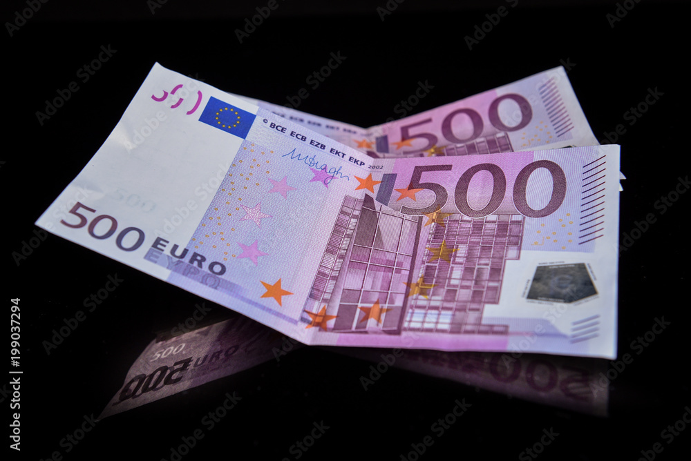Euros reflected of a black glass surface Euros reflected of a black glass surface