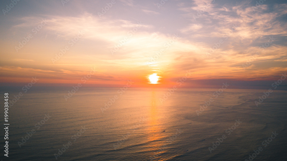 Naklejka premium beach at sunset aerial