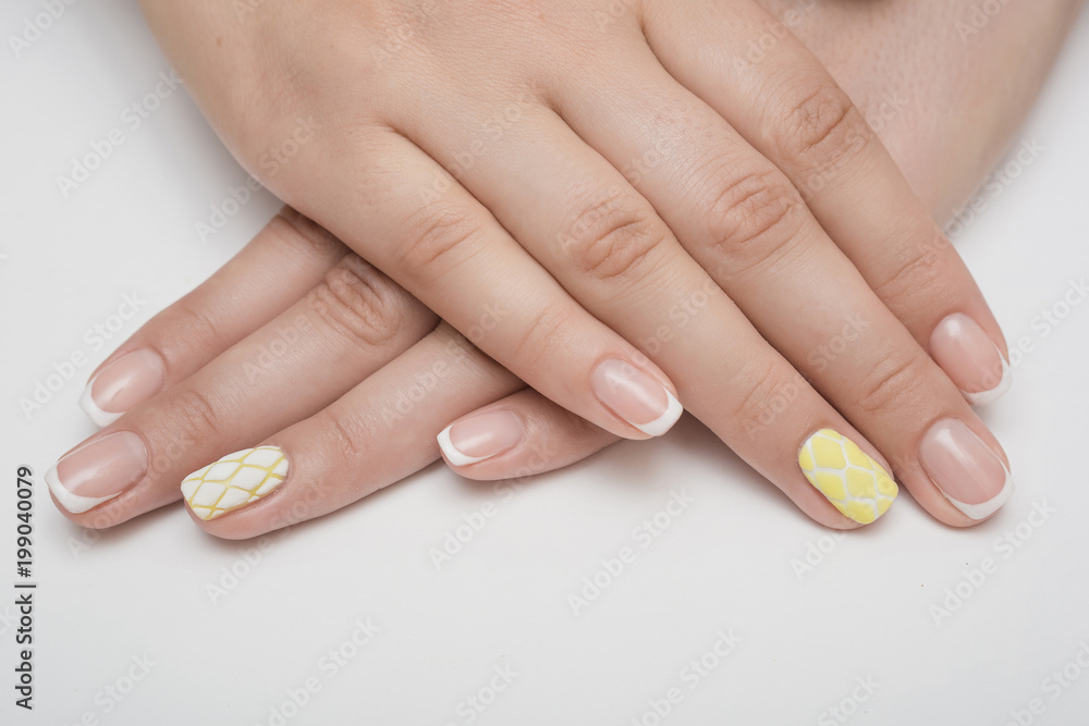 Beautiful woman's nails with beautiful manicure. studio shot Beautiful woman's nails with beautiful manicure. studio shot