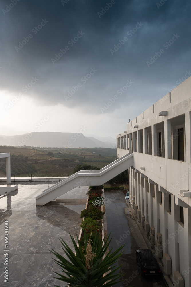 Building and mountain landscape