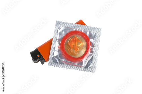 lighter and condom isolated on white background