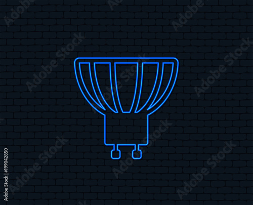 Neon light. Light bulb icon. Lamp GU10 socket symbol. Led or halogen light sign. Glowing graphic design. Brick wall. Vector