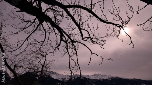 Gloomy landscape over the Alps photo