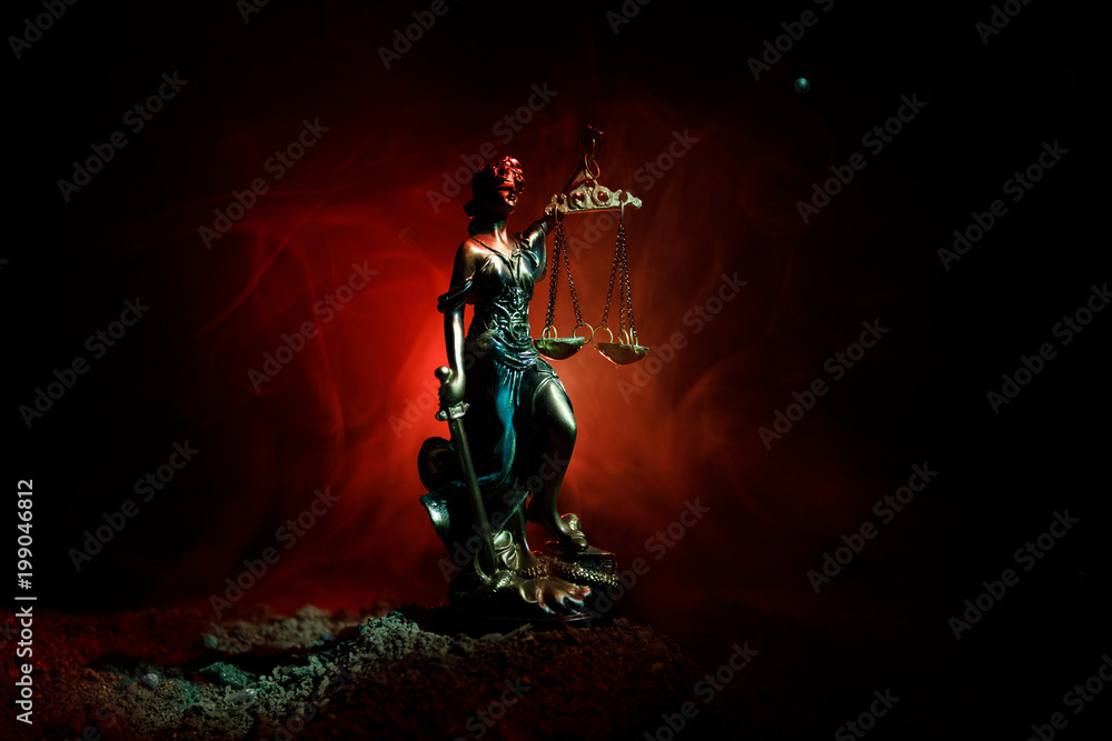 Obraz premium The Statue of Justice - lady justice or Iustitia / Justitia the Roman goddess of Justice on a dark fire background