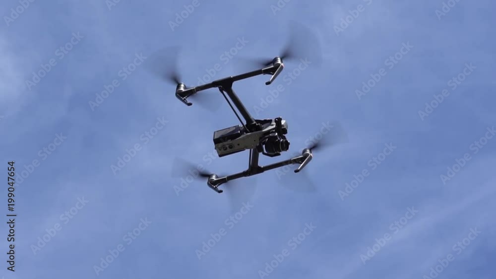 flying drone with blue sky