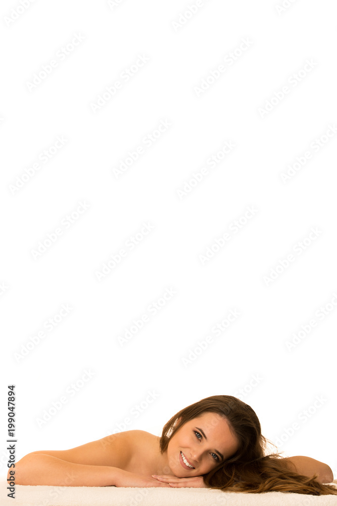 Skin care - beauty portrait of cute caucasian woman lying on table covered with white towel Skin care - beauty portrait of cute caucasian woman lying on table covered with white towel