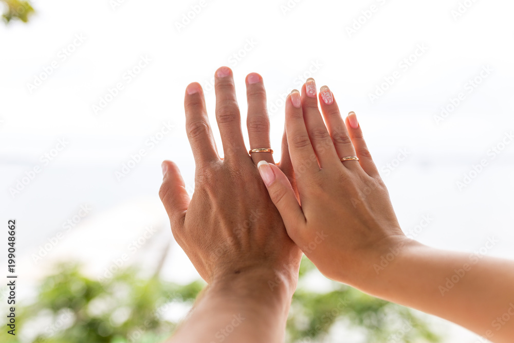 picture of man and woman hands with wedding ring picture of man and woman hands with wedding ring