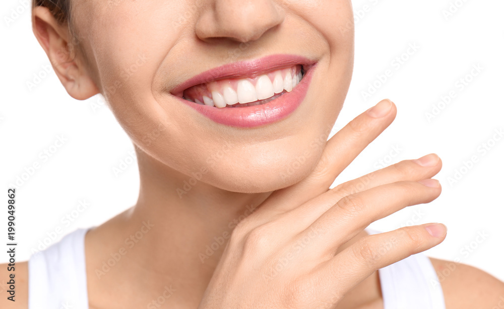 Young woman with beautiful smile on white background, closeup. Teeth whitening Young woman with beautiful smile on white background, closeup. Teeth whitening