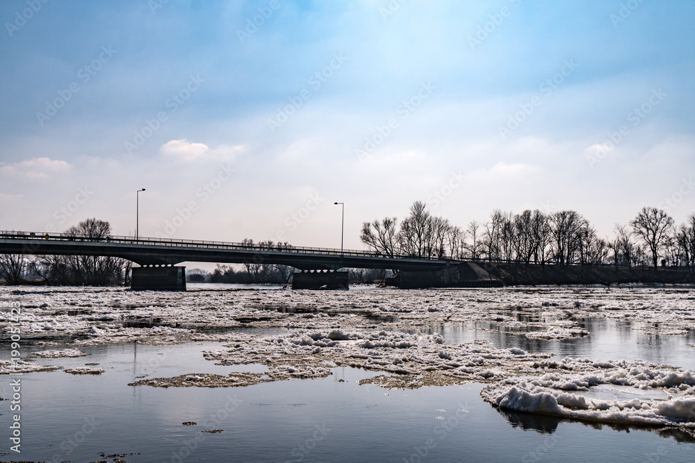Obraz premium bridge over a snow covered river