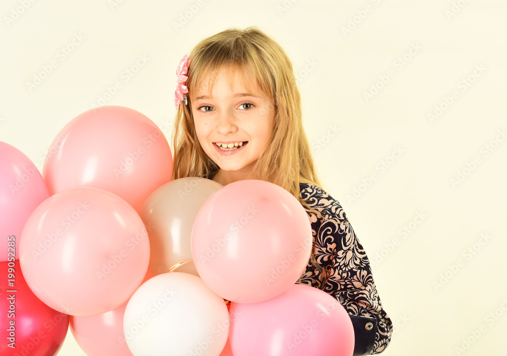 Small girl child with party balloons, celebration. Little girl with hairstyle hold balloons. Kid with balloons at birthday. Beauty and fashion, punchy pastels. Birthday, happiness, childhood, look. Small girl child with party balloons, celebration. Little girl with hairstyle hold balloons. Kid with balloons at birthday. Beauty and fashion, punchy pastels. Birthday, happiness, childhood, look.