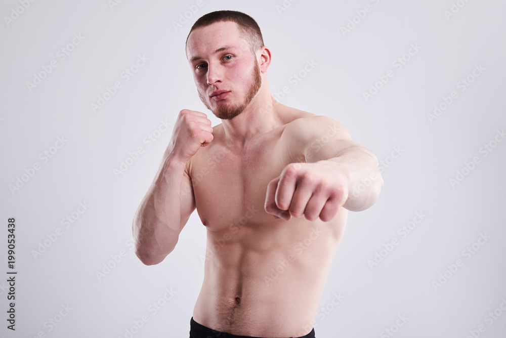 Fototapeta premium strong fighter in studio