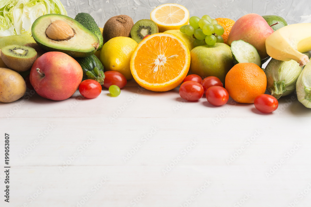 Fresh vegetables and fruits over white wooden background Fresh vegetables and fruits over white wooden background