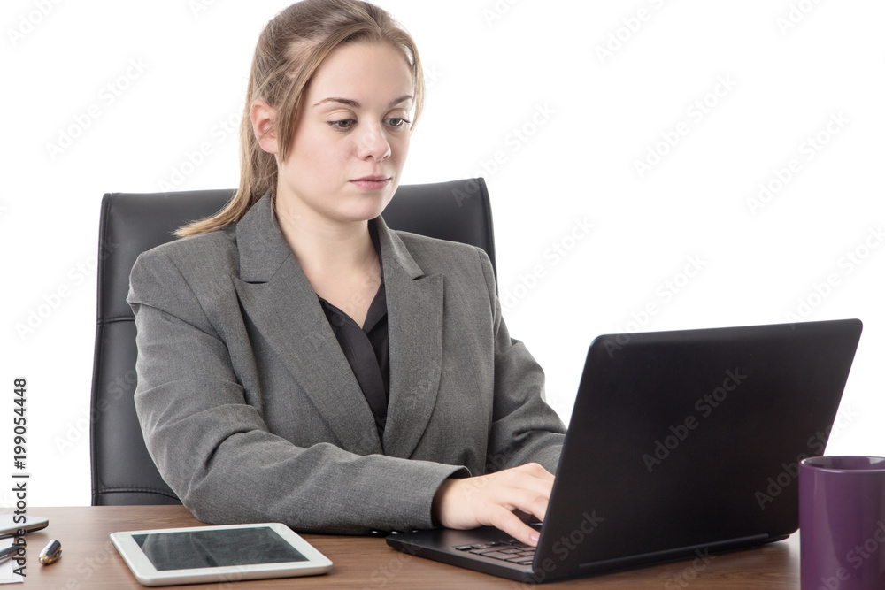 young business woman sitting a her desk young business woman sitting a her desk