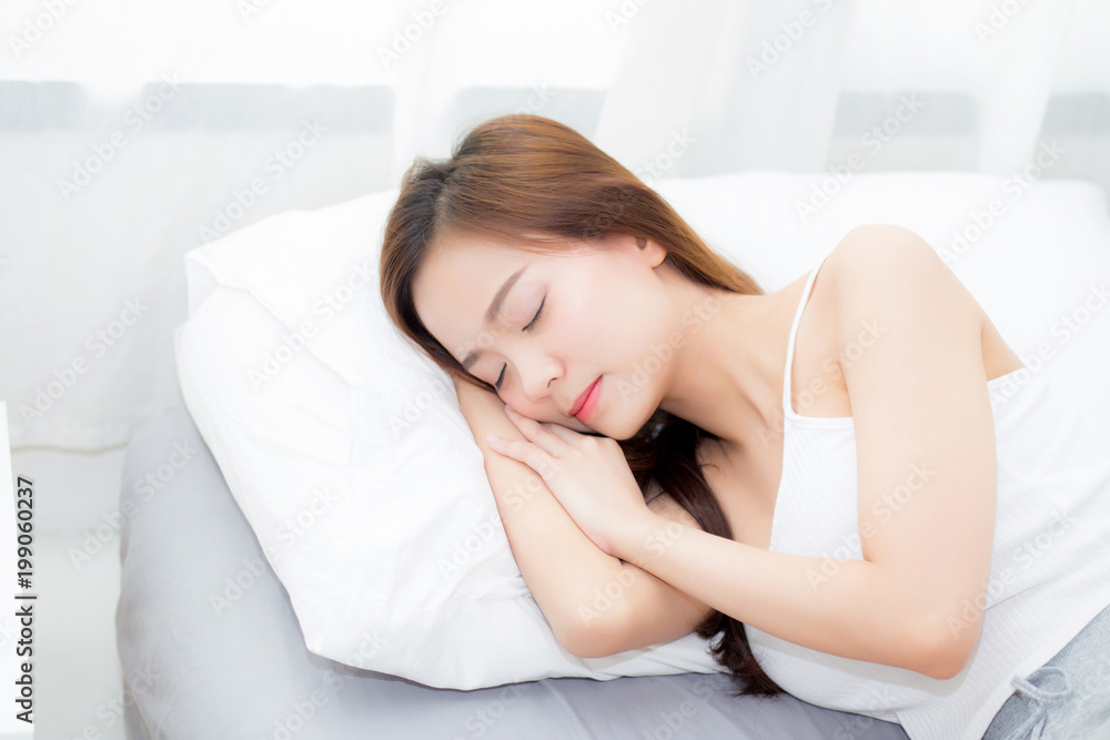Beautiful asian young woman sleeping lying in bed with head on pillow comfortable and happy. girl with relax for health concept. Beautiful asian young woman sleeping lying in bed with head on pillow comfortable and happy. girl with relax for health concept.