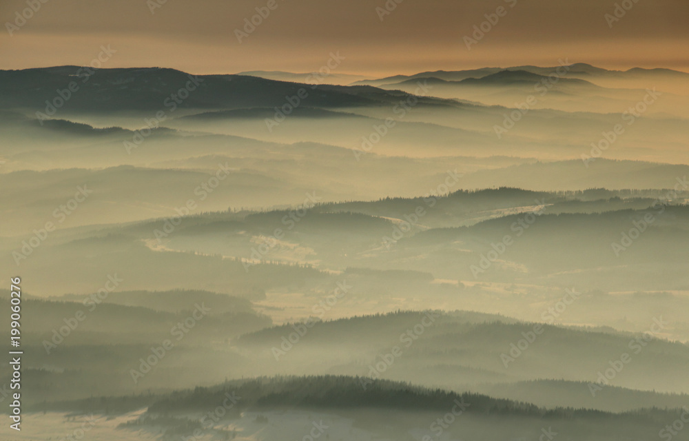 Silhouette of mountain ridges in sea of fog in glowing morning sunlight at sunrise from Babia Gora, Gorce and Beskid Sadecki ranges Beskidy Zachodnie Podhale Malopolska Poland Eastern / Central Europe Silhouette of mountain ridges in sea of fog in glowing morning sunlight at sunrise from Babia Gora, Gorce and Beskid Sadecki ranges Beskidy Zachodnie Podhale Malopolska Poland Eastern / Central Europe