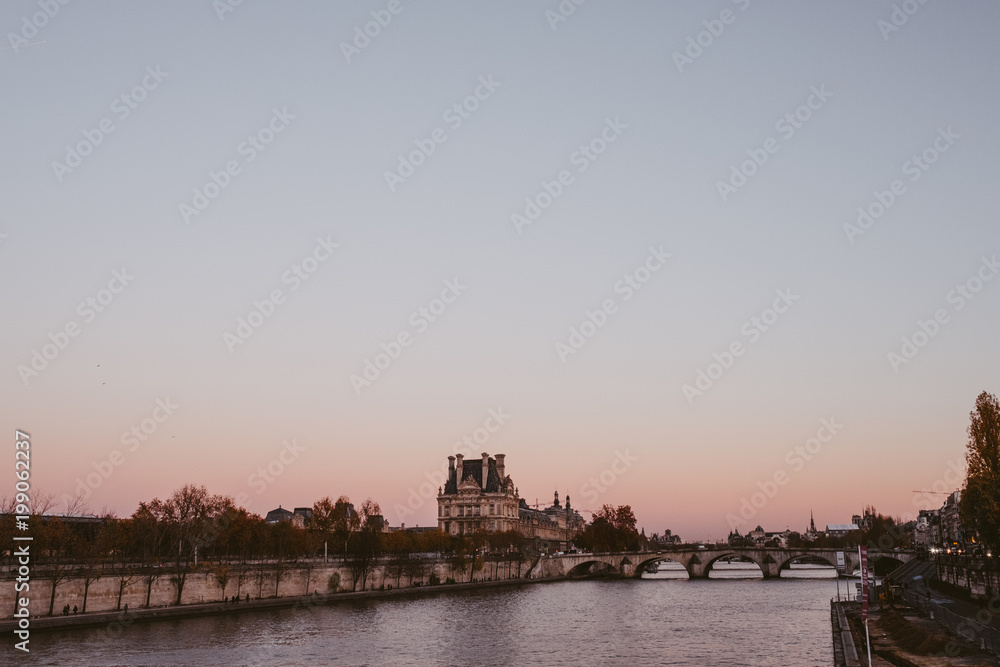 The Seine in Paris with a pink sunset