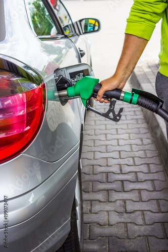 A pumping gas in to the tank