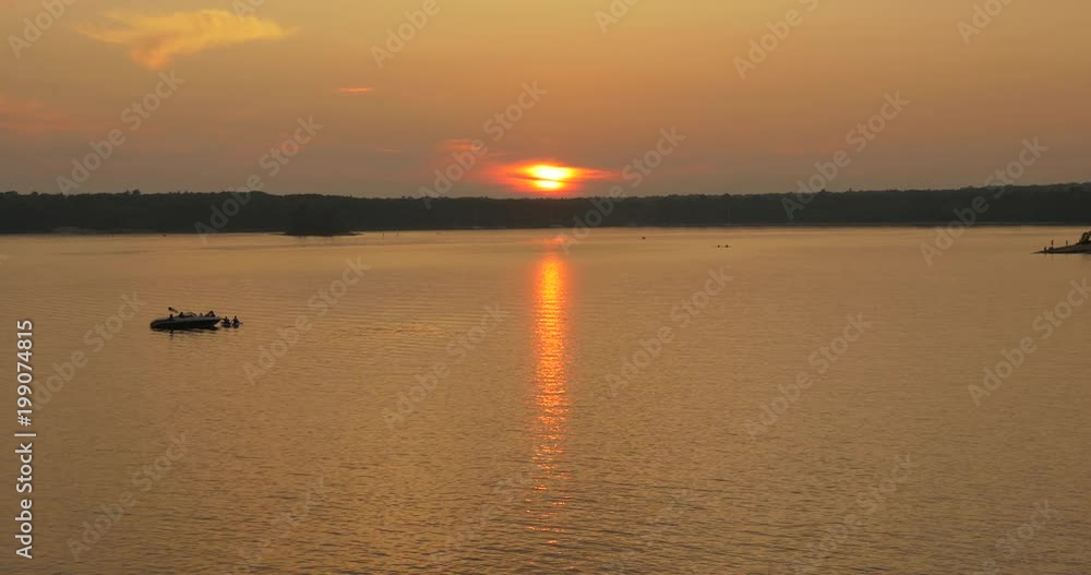 Boats on lake at sunset Boats on lake at sunset