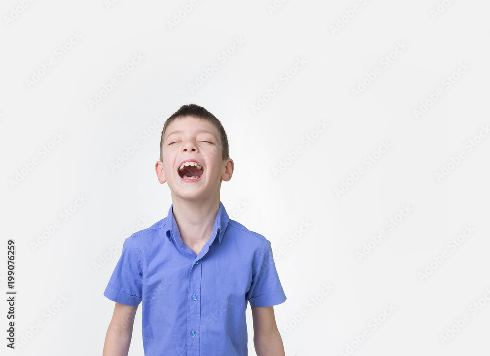 Portrait of smiling teen boy. Happy teenager wearing t-shirt. Portrait of smiling teen boy. Happy teenager wearing t-shirt.