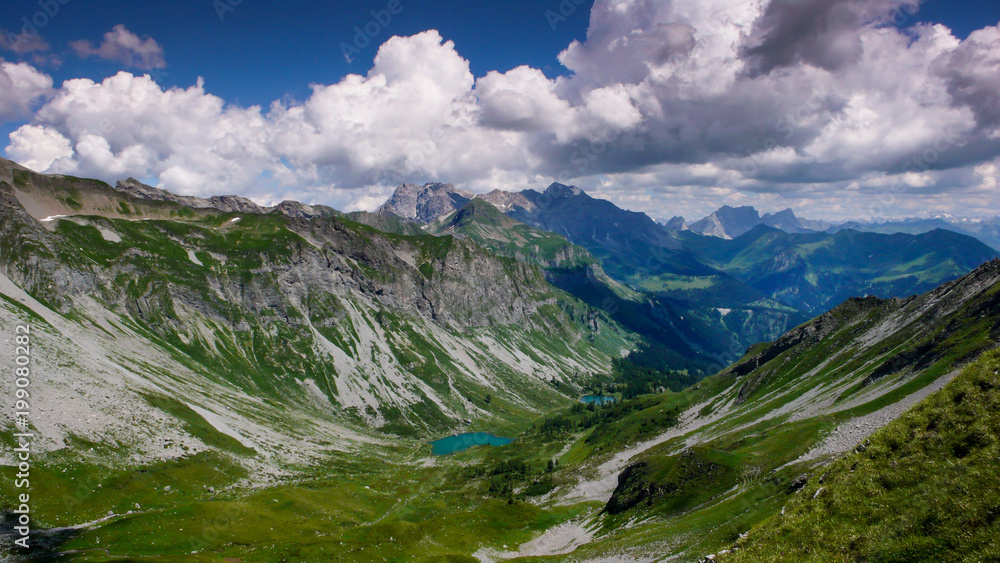 gorgeous mountain landscape with small lakes and a great view of the Alps near Klosters in Switzerland