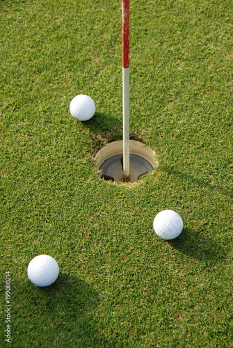 Golf ball close to hole