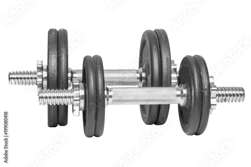 Two different gym black metal dumbbells for fitness isolated on a white background