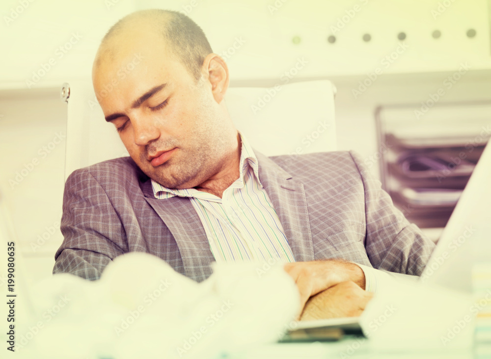 Naklejka premium Employe man relax and sleeping