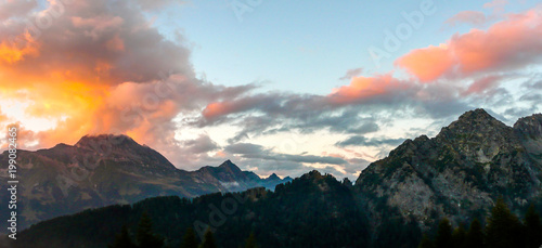 sunset over a fantastic mountain landscape in the Swiss Alps photo